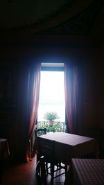 View of empty room through window