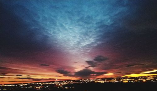 Scenic view of dramatic sky during sunset