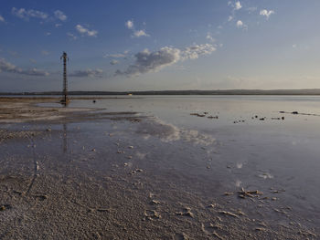 Sunset on the pink lagoon of the salt flats of torrevieja, spain