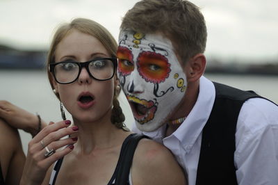 Portrait of couple making face