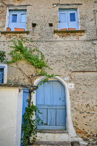 The door of an old house in acri, an old village in calabria region, italy.