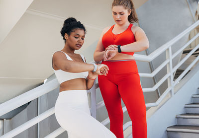 Young woman exercising in gym