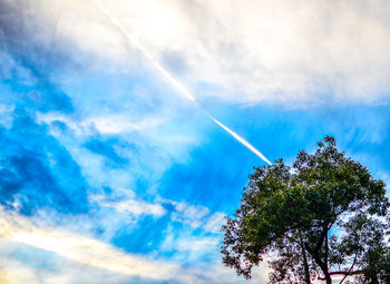 Low angle view of vapor trail in sky