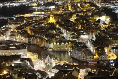 High angle view of illuminated cityscape at night