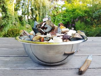 Close-up of sliced mushrooms in bowl on table