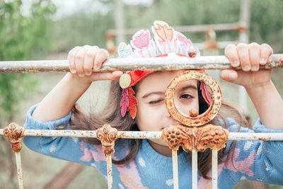 Close-up portrait of girl holding ice cream