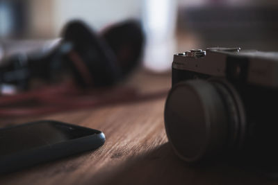 Close-up of camera on table