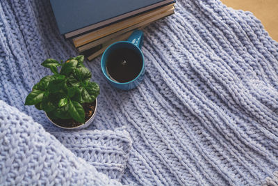 High angle view of coffee cup on table at home