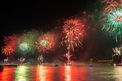 Firework display at night