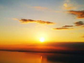 Scenic view of landscape against sky during sunset