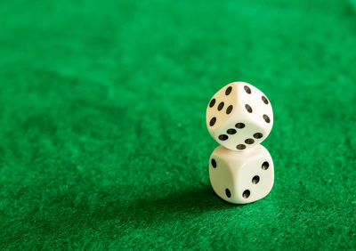 High angle view of ball on green table