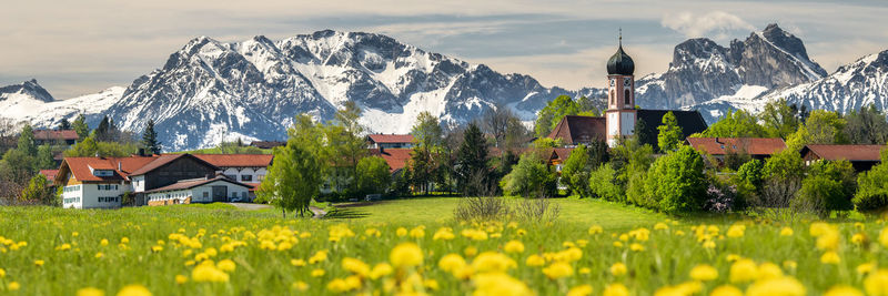 Panoramic landscape with mountain range and village