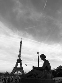 Low angle view of eiffel tower against blue sky during sunset