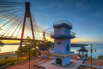 View of tower against cloudy sky
