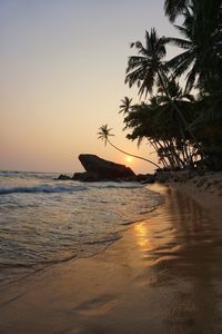 Scenic view of sea against sky at sunset