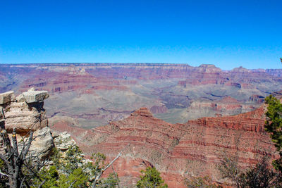 Scenic view of rock formations against sky