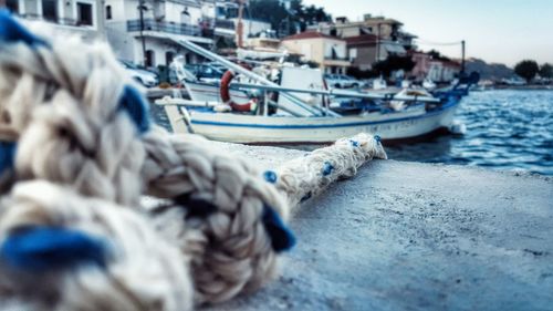 Boats moored at harbor