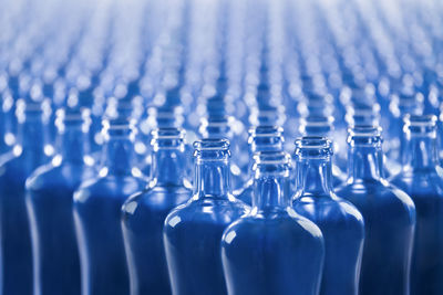 Close-up of bottles in row