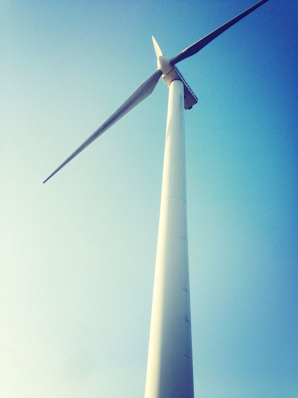 wind power, alternative energy, wind turbine, renewable energy, windmill, low angle view, environmental conservation, fuel and power generation, clear sky, traditional windmill, technology, sky, religion, cross, blue, day, no people, outdoors, tall - high