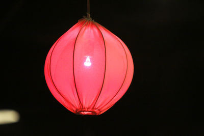Close-up of illuminated lantern hanging at night