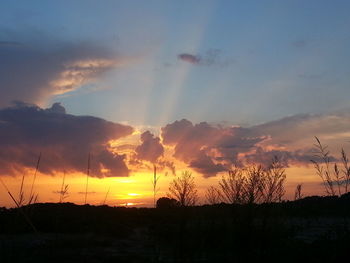 Scenic view of landscape at sunset