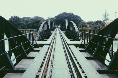 Metal bridge against sky