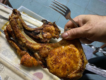 High angle view of person preparing food