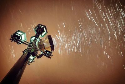 Low angle view of camera against sky