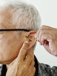 Close-up of senior man looking away