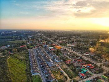 High angle view of cityscape against sky during sunset