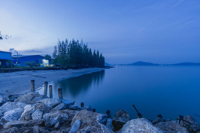 Scenic view of lake against blue sky