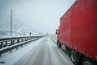 Vehicle trailer on snow covered road