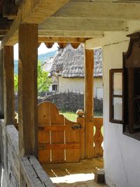 Wooden gate at porch of house