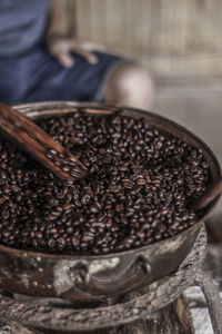 Close-up of coffee beans on table