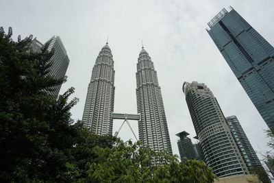 Low angle view of skyscrapers against sky