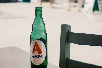 Close-up of beer bottle on table