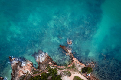 High angle view of rocks on shore