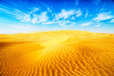 Scenic view of desert against sky