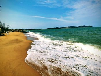 Scenic view of beach against sky