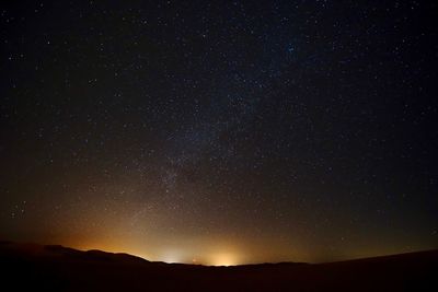 Low angle view of stars in sky at night