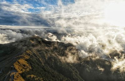 Aerial view of majestic mountains against sky