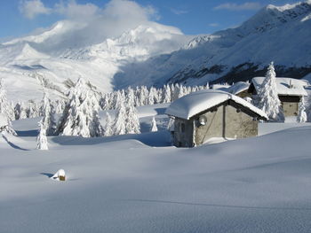 Snowcapped mountains against sky