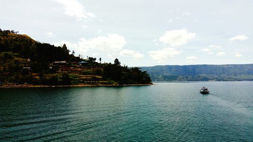 Scenic view of river against sky