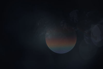 Digital composite image of moon against black background