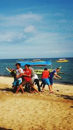 People enjoying at beach