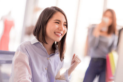 Portrait of a smiling young woman