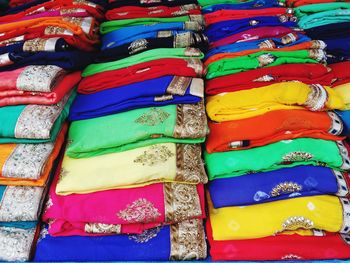 Full frame shot of multi colored saris in store