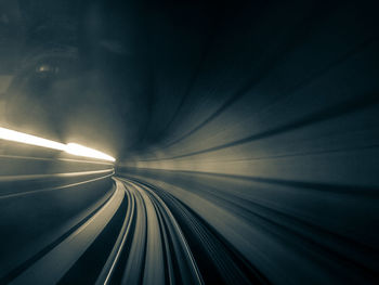 Blurred motion of railroad tracks in tunnel