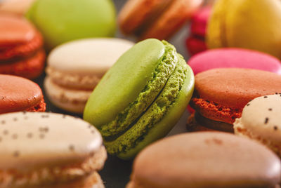 Full frame shot of colorful macaroons on table