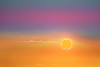 Scenic view of moon against sky during sunset